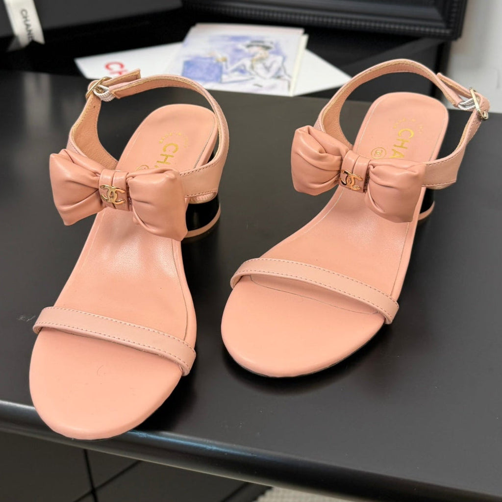CHANEL MID HEEL SANDALS IN PEACHY PINK CALFSKIN WITH BOW